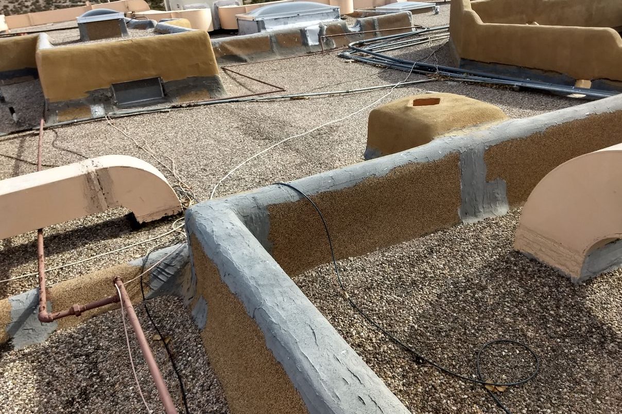 Ten thousand square foot spray foam and gravel roof system in Santa Fe